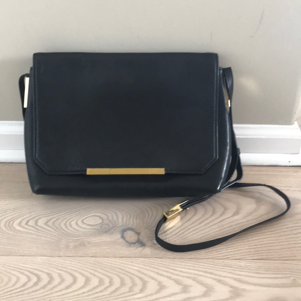 JCrew leather purse with brass detailing